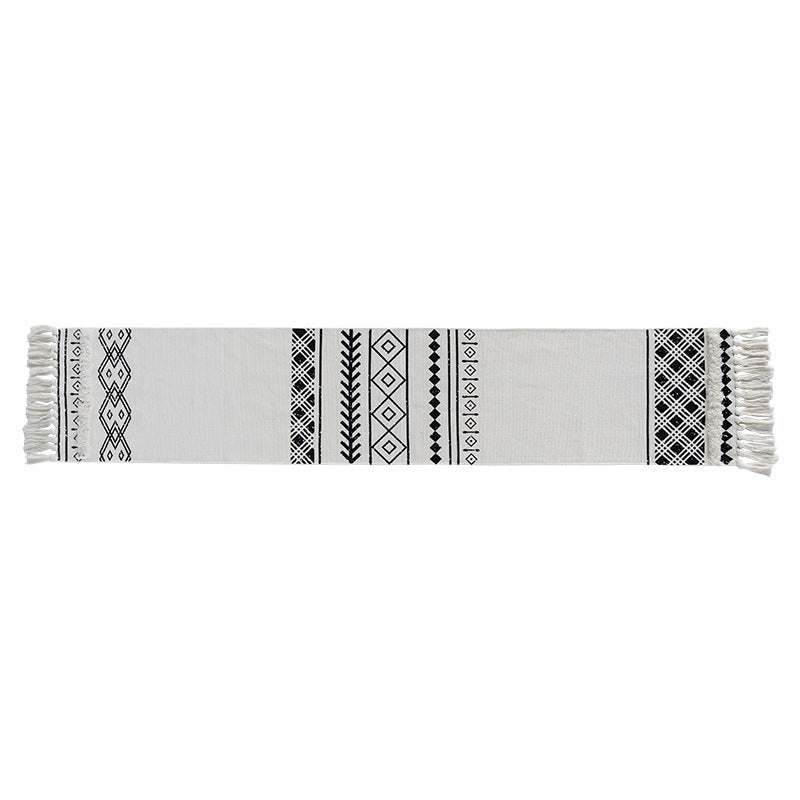 Boho-Tischläufer aus Baumwollmischgewebe mit gewebtem Ethno-Jacquard und dekorativen Fransen