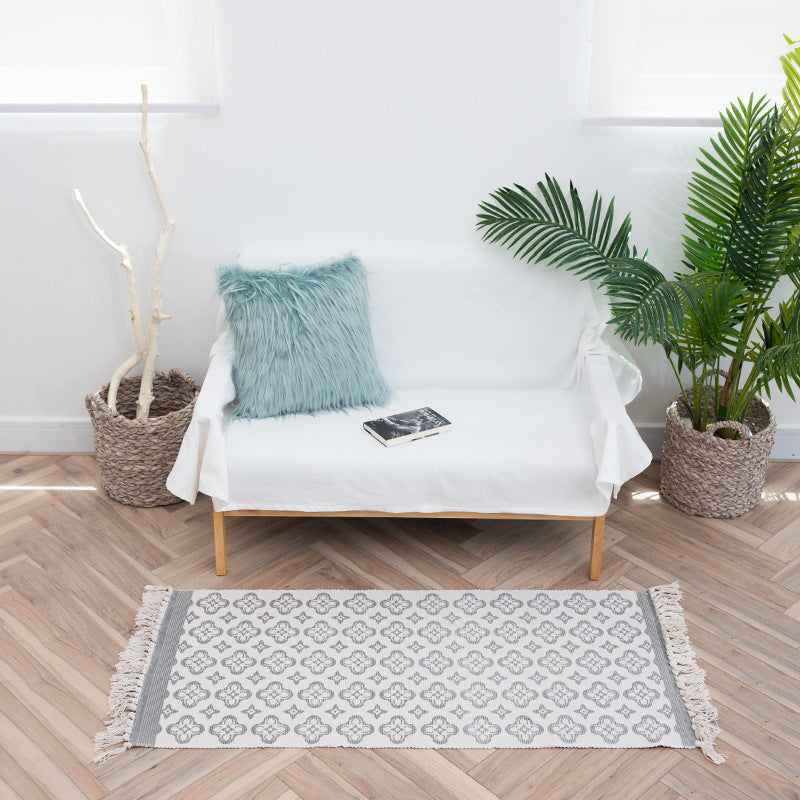 Flat-woven cotton runner with Mediterranean tile jacquard