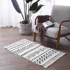 Flat-woven cotton runner with Boho-Ethno motif and decorative fringes