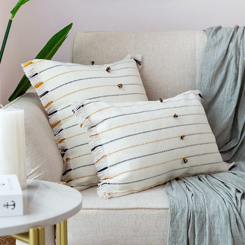 Decorative cotton cushion cover with striped tufted appearance and fringes