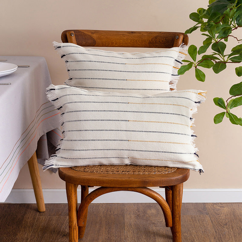 Decorative cotton cushion cover with striped tufted appearance and fringes