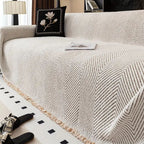 Sofaüberwurf mit Fischgrätmuster
