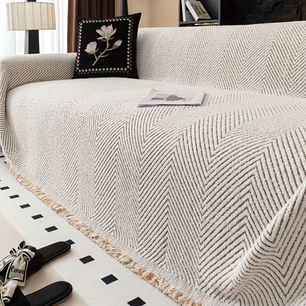 Sofaüberwurf mit Fischgrätmuster