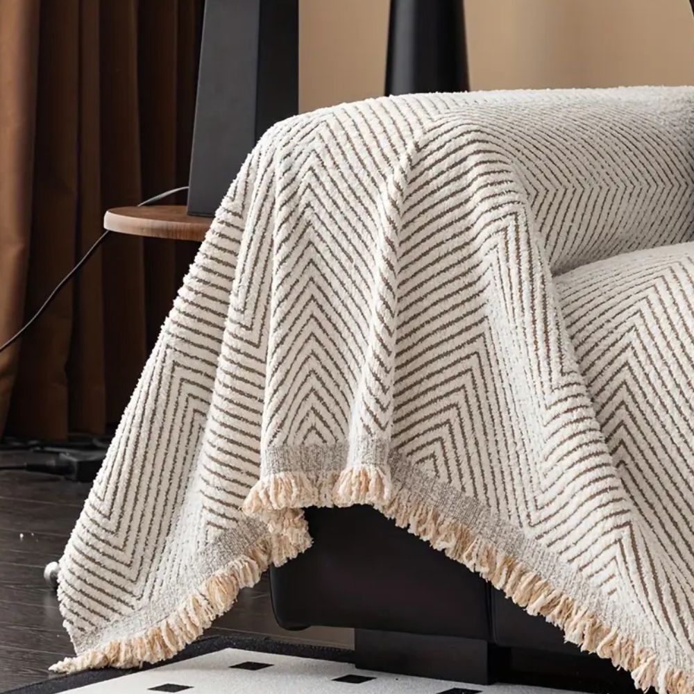 Sofaüberwurf mit Fischgrätmuster