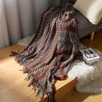 Bunte gestreifte Wohndecke mit Quasten