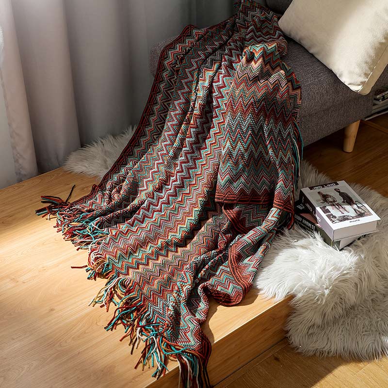Bunte gestreifte Wohndecke mit Quasten