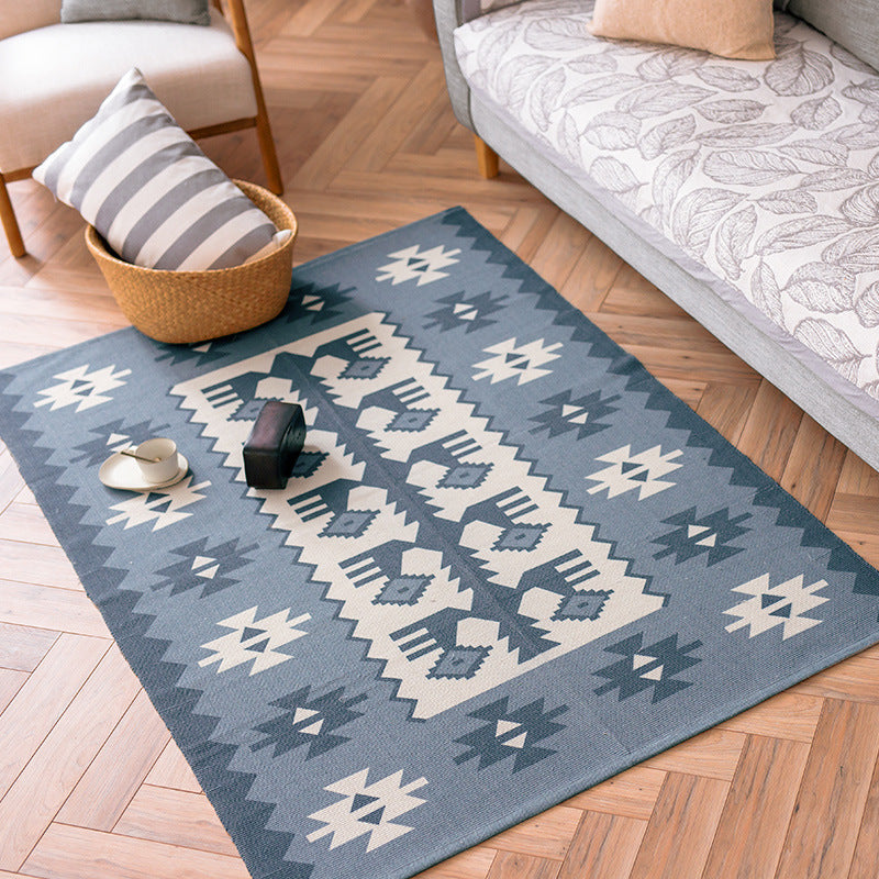 Flat-woven cotton runner with Mediterranean tile jacquard