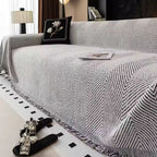 Sofaüberwurf mit Fischgrätmuster