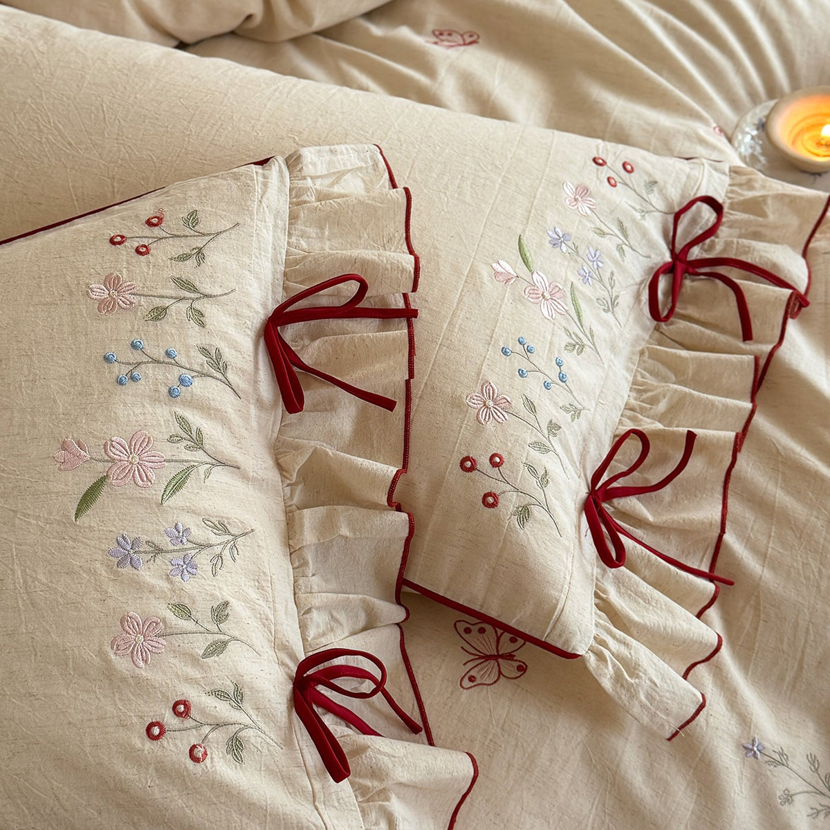Luxurious linen bedding set with hand-embroidered bamboo and bird motif