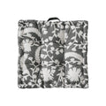 Padded floor cushion with quilted tufting, floral motif and carrying handle