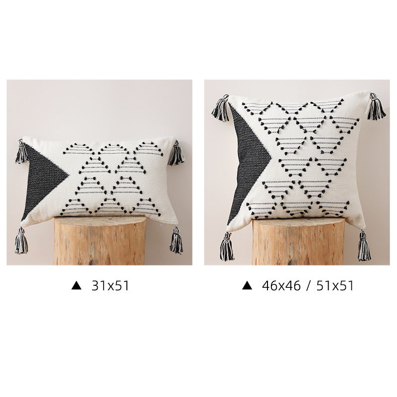 Dekorativer Web-Kissenbezug mit geometrischem Tuft-Relief und Quasten