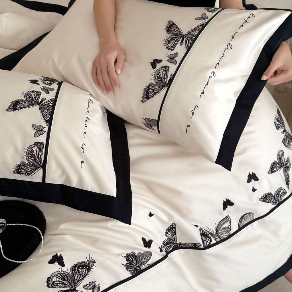 Luxurious cotton satin bedding set with butterfly embroidery and contrasting piping