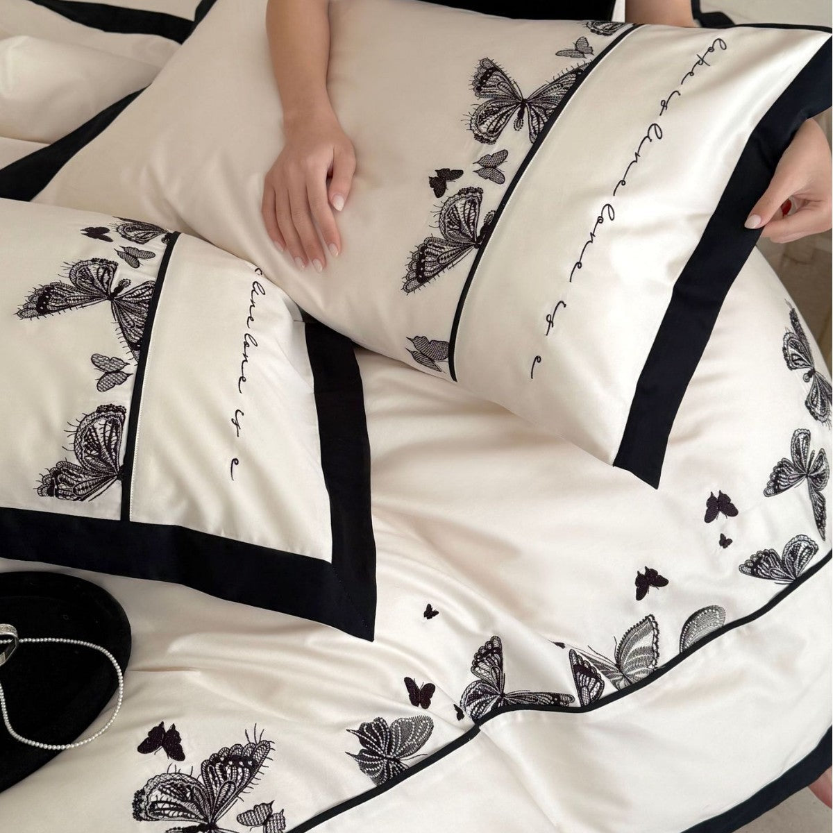 Luxurious cotton satin bedding set with butterfly embroidery and contrasting piping