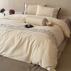 Luxury bedding set with embroidered border detail
