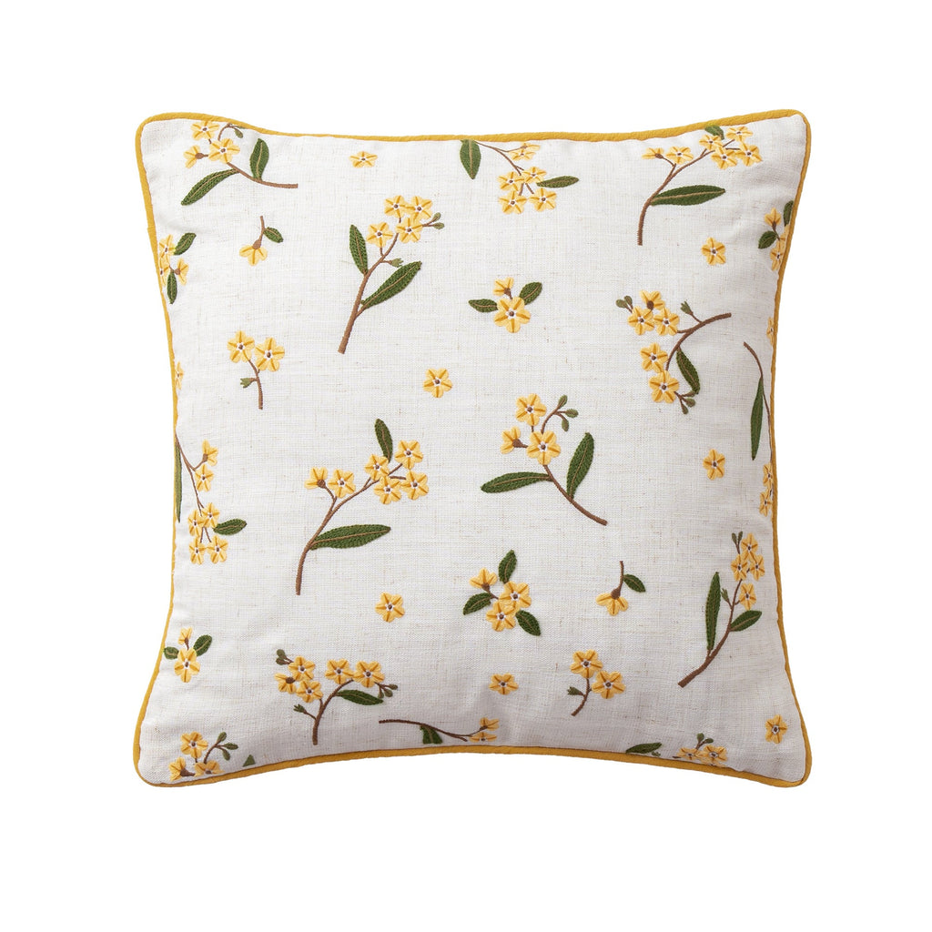 Embroidered linen decorative pillow with floral embroidery and piping