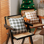 Square living decorative pillow with woven check structure and pom-pom corners