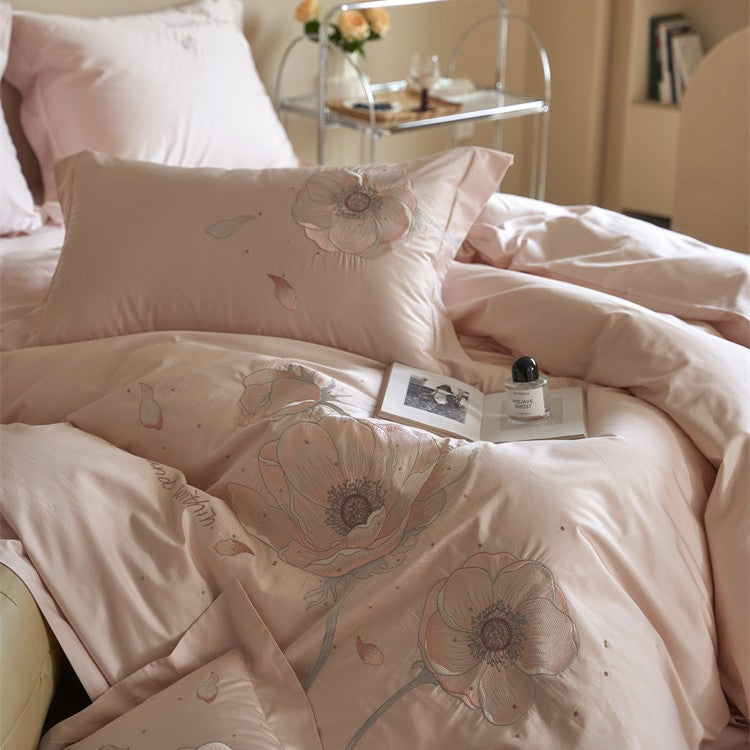 Satin bedding set with floral relief embroidery