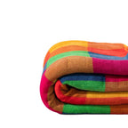 Bunte gemusterte Wohndecke