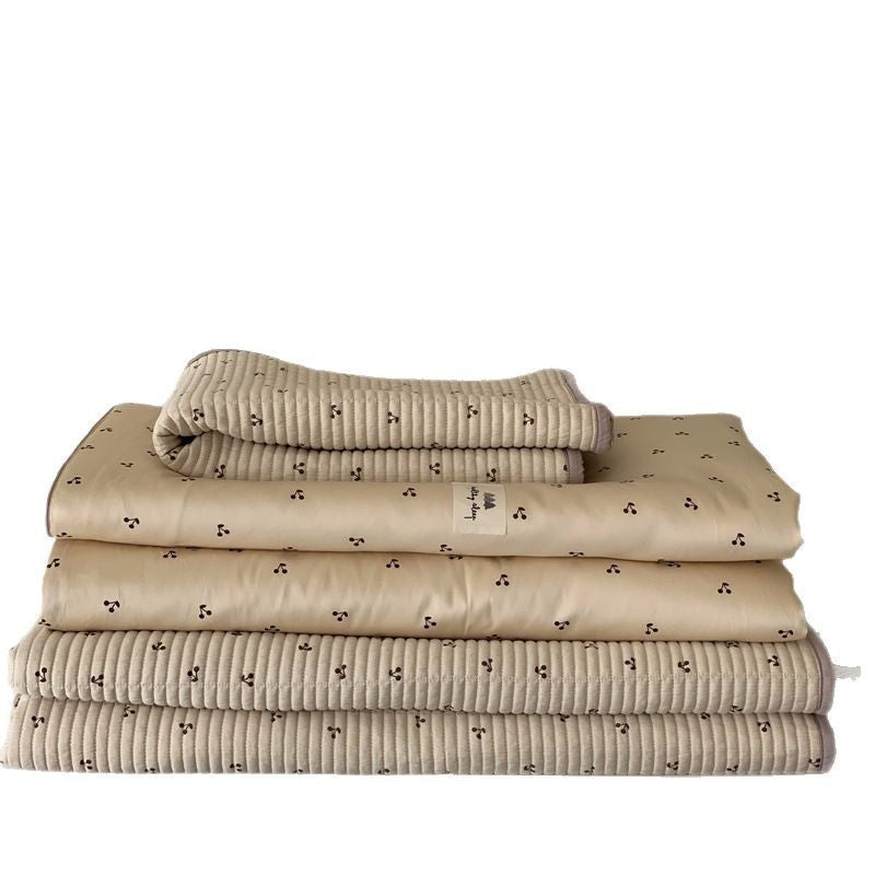 Padded children's bed pad and play mat with duck print