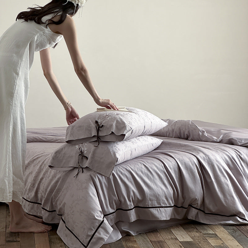 Jacquard-Satin-Bettwäscheset mit Blumenapplikation und Zierschleife