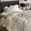 Bettwäsche-Set aus Baumwollsatin mit floralem Rosenmuster und voluminöser Rüsche