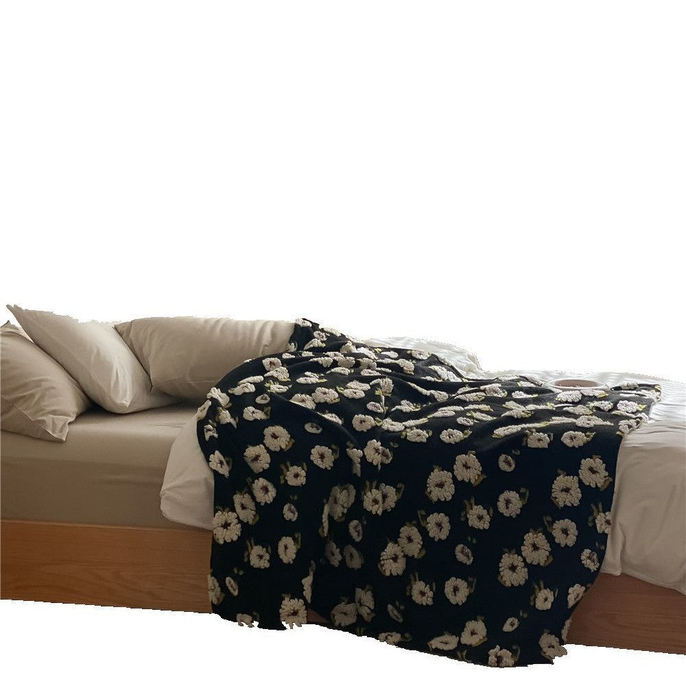 Kuscheldecke mit floraler Bouclé-Oberfläche und Minky-Fleece-Rückseite