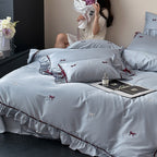 Premium bedding set made of cotton satin with ruffles and bow embroidery