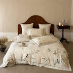 Luxurious linen bedding set with hand-embroidered bamboo and bird motif